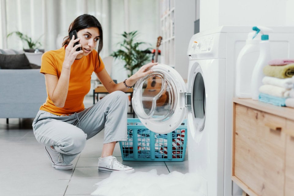 Chicago homeowner dealing with a broken washing machine, calling for same-day laundry help from Drop & Dash
